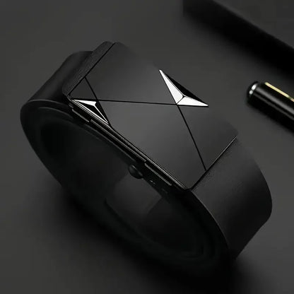Black geometric object with metallic accents on a dark surface