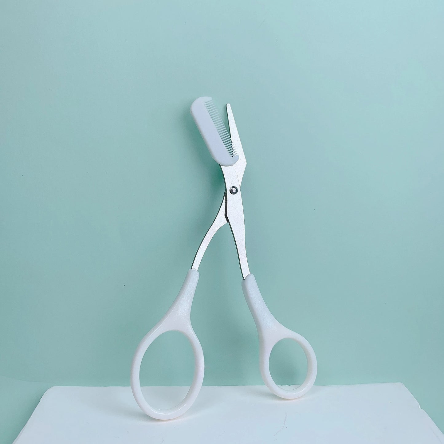 Pink Eyebrow Trimming Scissors with Comb – Precise Grooming Tool