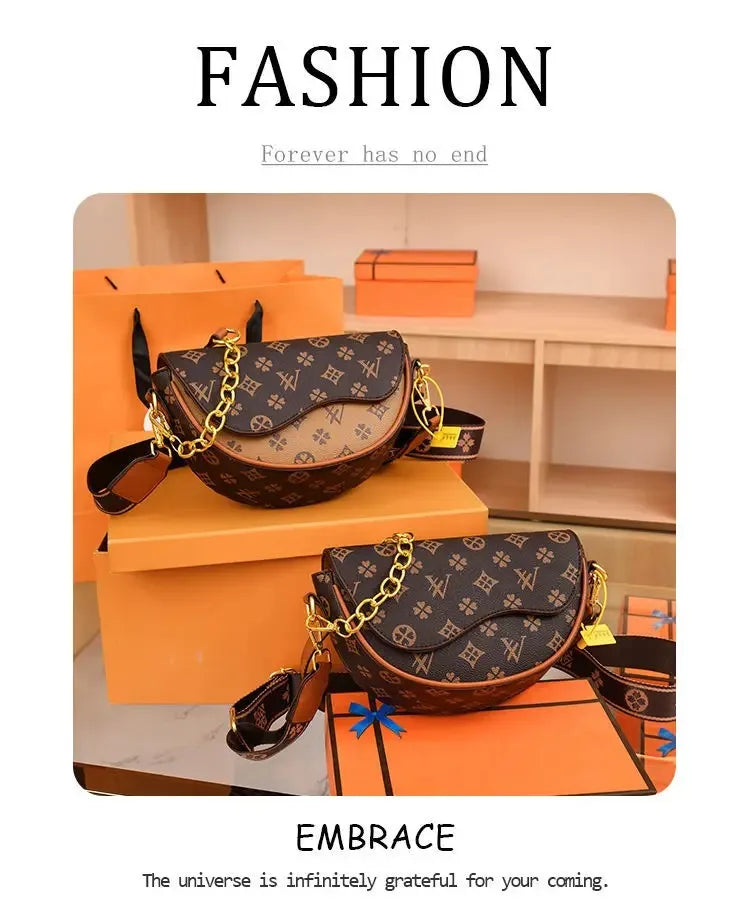 Compact fashion purse with curved saddle design