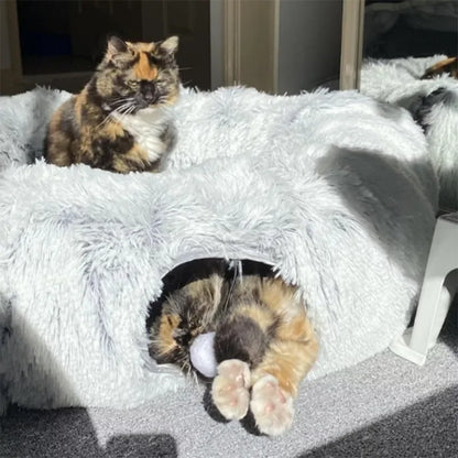 Top view of soft donut cat bed showing peephole and cozy nest design