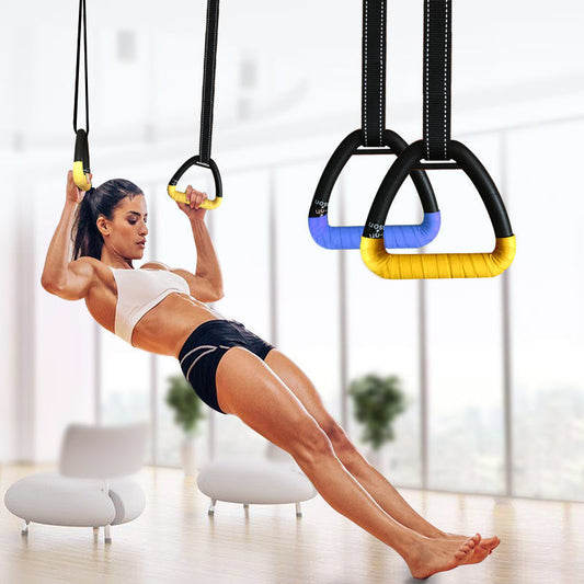Multifunctional suspension training ring on horizontal bar for strength exercises.

